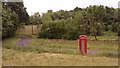 H1254 : Phone box on country road by Hywel Williams