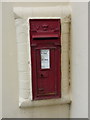 Victorian postbox in a wall in Longden Common