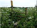 Footpath and stile to Help-Out Mill