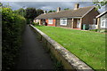 Bungalows by the footpath