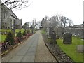 NX1485 : Churchyard at St Colman Parish Church by Ann Cook