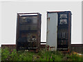 NT9757 : Derelict line side electrical equipment cabinets by Graham Robson