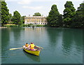 TQ1877 : Rowing boat on pond in front of Kew Gardens museum by David Hawgood