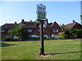 The village sign on the green at Brasted