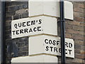 Inscribed quoins at Queen