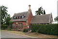 Old estate cottage opposite Stainby Church