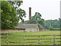 SK9406 : Boiler house chimney at Normanton Lodge Farm by Richard Humphrey