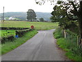 J3041 : View towards the cross roads from Benraw Road by Eric Jones