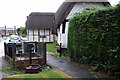 Lower Street pump and thatched cottage