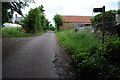 Country road passing Lockeridge Farm