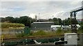 SJ8989 : Approaching Stockport station from the south: Network Rail depot by Christopher Hilton