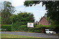 House and protest sign on Woodford Road