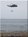 NZ4060 : Search and Rescue helicopter displaying a flag, Sunderland International Airshow by Graham Robson