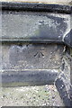 Benchmark on buttress of All Souls Church