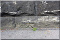 Benchmark on Clarendon Road wall