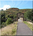 NE side of a footbridge over the A4233, Ynyshir