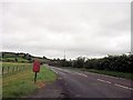 A489 and post box at Llamcowrid