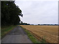 Footpath to the B1119 Church Hill & entrance of Wood Farm