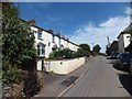 A short terrace of houses set back from Essington Road, North Tawton