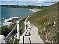 SS5986 : View westwards along the coast path from Whiteshell Point towards Caswell Bay sands by Jeremy Bolwell
