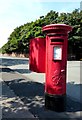 King George VI postbox with a box on its back