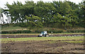 NZ0928 : Ploughing a field adjacent to Emms Hill Lane by Trevor Littlewood