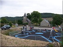 NR8593 : Play area and the Church at Kilmichael Glassary, Argyll by Elliott Simpson