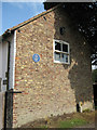 Cottage with blue plaque