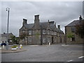 Junction of Reidhaven Square with Mid Street (S)