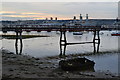 Sunset over rusting pier and decommissioned warships, Priddy