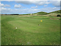 NU2422 : The 18th tee at Dunstanburgh Castle Golf Club by Graham Robson