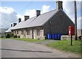 NT9535 : Terraced farmworkers cottages near Kimmerston by Stanley Howe