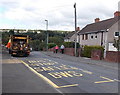 Relining of bus stop road markings complete, Badminton Grove, Ebbw Vale 