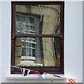 Window reflection with bunting