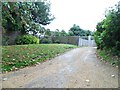 The entrance to Pitch Place Farm off Thursley Road