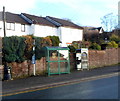 Bus shelter bearing the coat of arms of Cinderford