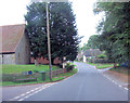 Main Road passes junction with Church Lane