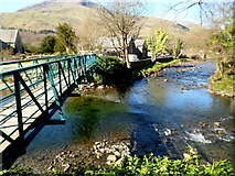 SH5948 : Footbridge at a river confluence in Beddgelert by Jaggery