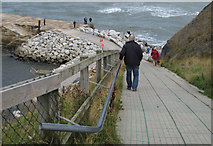 NZ9011 : Down to East Pier by Pauline E