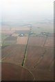 Disused railway trackbed across Farlesthorpe Fen: aerial