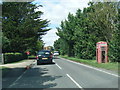 A1031 Warren Road and damaged phone box