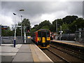 SJ9541 : Train leaving Blythe Bridge station by Richard Vince