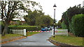 TQ0892 : Entrance barrier, Moor Park Estate by Malc McDonald