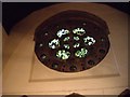 NZ2643 : Wheeled window with arched stone dressing in St Cuthbert's by Stanley Howe