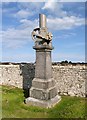 A memorial at Kinneddar Cemetery, Lossiemouth