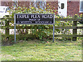 TM2993 : Triple Plea Road sign by Geographer