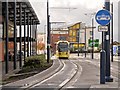 SJ9399 : Metrolink Tram on Wellington Road by David Dixon