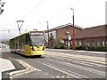 SJ9098 : Tram on Ashton Road by David Dixon