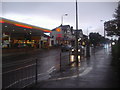 TQ2665 : Shell garage and shops on Wrythe Lane by David Howard