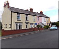 Morris Minor 1000 parked in front of a short row of houses in Wellington